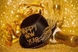 A top hat that says "happy new year"